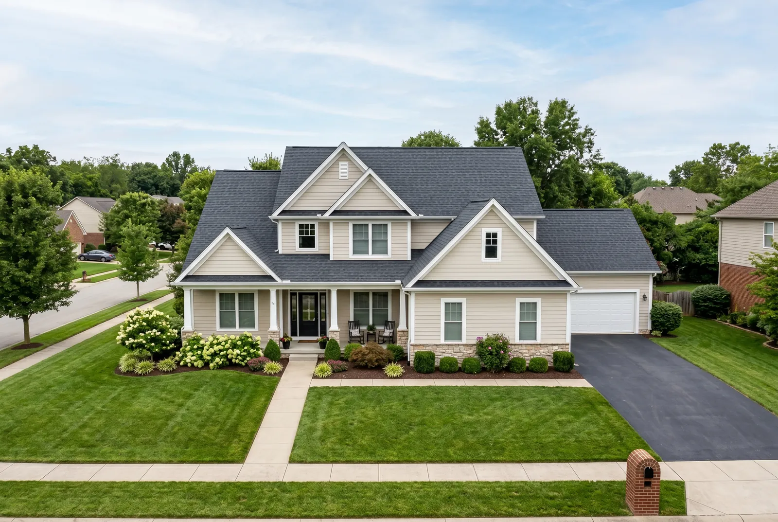 Soft wash roof cleaning in Louisville, KY by Noah's Pressure Washing, black algae streaks removed from asphalt shingles