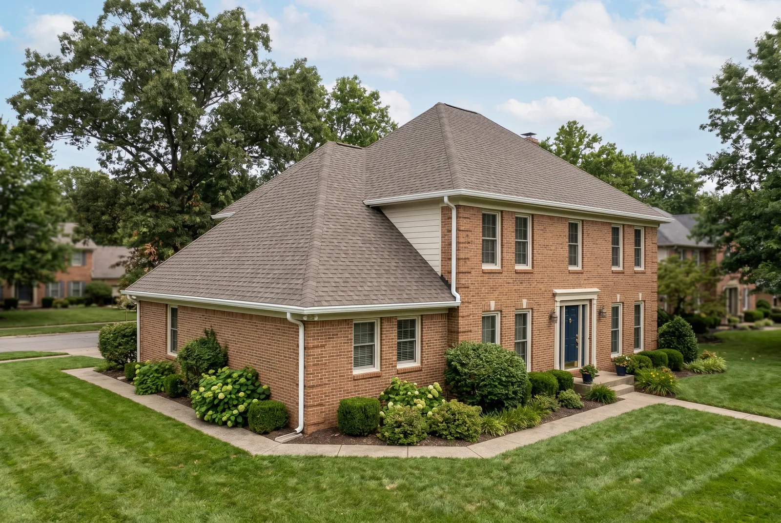 Shingle roof after soft washing in Douglass Hills, KY by Noah's Pressure Washing, clean shingles