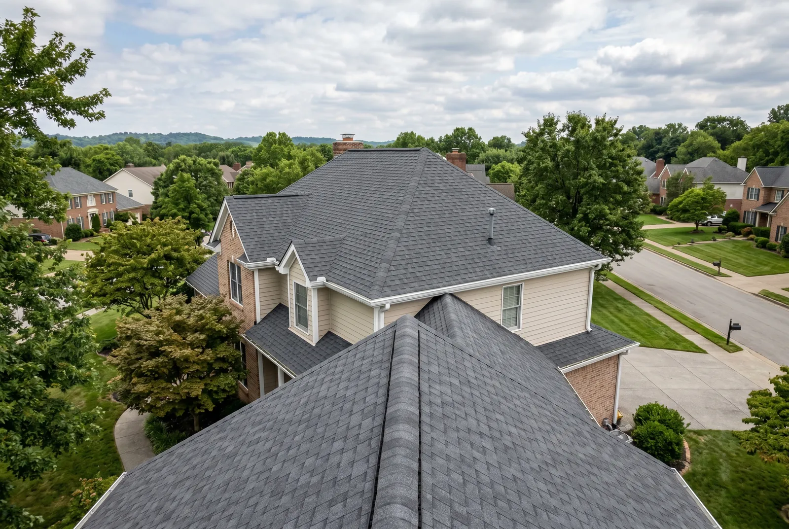 Asphalt shingle roof after soft washing in Norton Commons, KY by Noah's Pressure Washing, clean uniform shingles